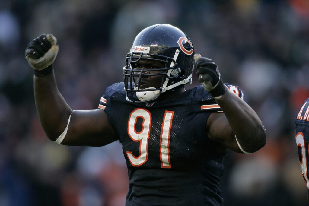 Former Chicago Bears standout Tommie Harris was arrested and threatened to have the Cops fired by the Governor