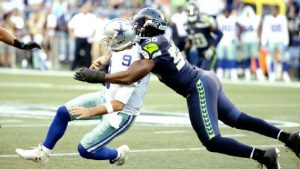 Cliff Avril says Tony Romo told him to not worry about the hit that broke his back