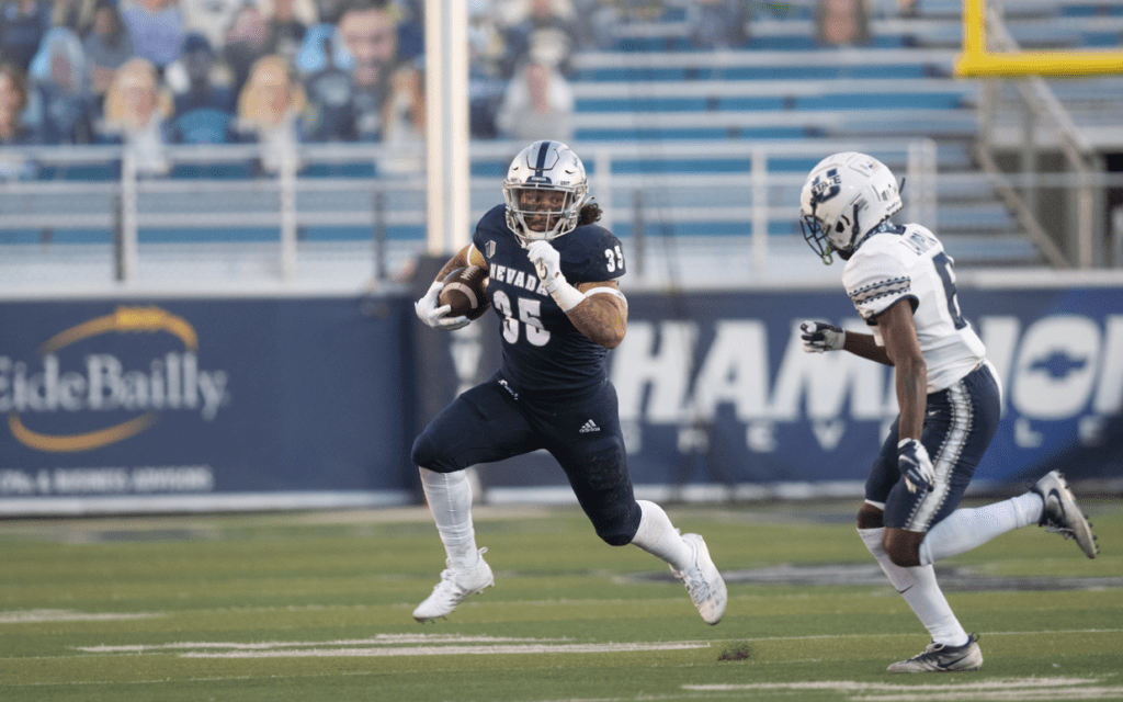Toa Taua is a bruising RB from Nevada who often takes receptions out of the backfield. Hula Bowl scout CJ Marable breaks down Taua as an NFL Prospect in this article.