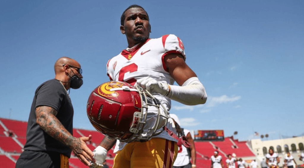 Former USC football player arrested and charged with three counts of rape