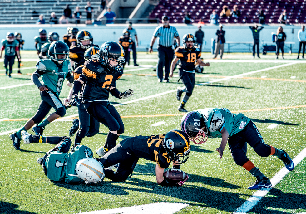 Why is football dangerous? 10 reasons parents should be cautious about letting their kids play