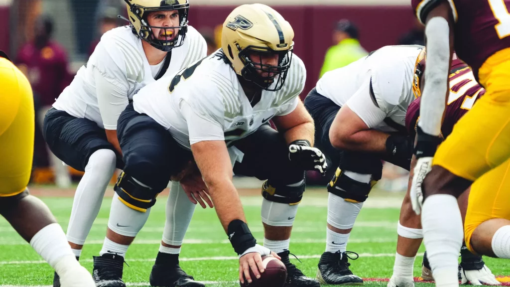 Gus Hartwig is a smart center who is a very good pass protector for Purdue. Hula Bowl scout Bryan Ault breaks down Hartwig as an NFL Prospect in his report.
