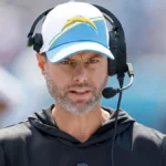 Chargers head coach has a heated exchange with reporters after asked about historic playoff meltdown