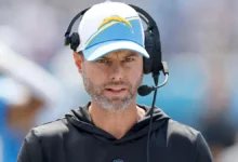 Chargers head coach has a heated exchange with reporters after asked about historic playoff meltdown