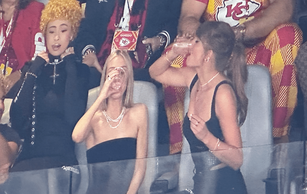 Taylor Swift chugs a beer before halftime, which may be the highlight of the game so far