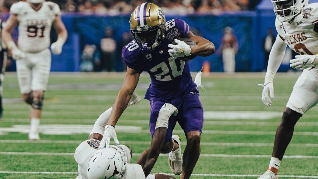 Washington Huskies RB Tybo Rogers arrested for raping two women