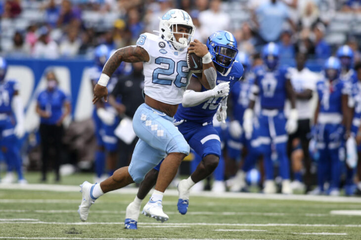 Meet Omarion Hampton, a standout running back excelling at North Carolina with impressive stats and an impressive physique.