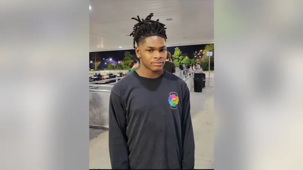 A 16-year-old high school football player from Beltsville, Maryland, was fatally shot inside his home over the weekend in what police are describing as a tragic and avoidable incident involving a firearm.
Derrick Palmer, a student-athlete at John F. Kennedy High School in Wheaton, was killed Saturday afternoon at his residence on Heartwood Drive, according to a statement from the Prince George’s County Police Department.
Investigators say Palmer was with two other individuals, including 18-year-old Kimaury Kamara of Mt. Holly Springs, Pennsylvania, when the shooting occurred in an upstairs bedroom. According to charging documents, Kamara admitted to detectives that he was handling a firearm and believed it was unloaded when he pointed it at Palmer and pulled the trigger. The gun discharged, striking Palmer in the head and fatally wounding him.
Kamara has been arrested and charged with manslaughter, possession of a “ghost gun,” and other related offenses. Authorities confirmed that he is being held without bond ahead of a hearing scheduled for June.
Police recovered three firearms from the scene — two Glock pistols and a third weapon identified as a ghost gun, which had a 30-round magazine and a machine gun conversion switch. Ghost guns are privately made firearms that lack serial numbers, making them difficult to trace.
The community is mourning the loss of Palmer, who was known for his dedication to football and his vibrant presence among teammates and classmates. Officials from John F. Kennedy High School expressed condolences to Palmer’s family and said counseling resources would be made available to students and staff.
The investigation remains ongoing as authorities continue to piece together the events leading up to the deadly shooting.