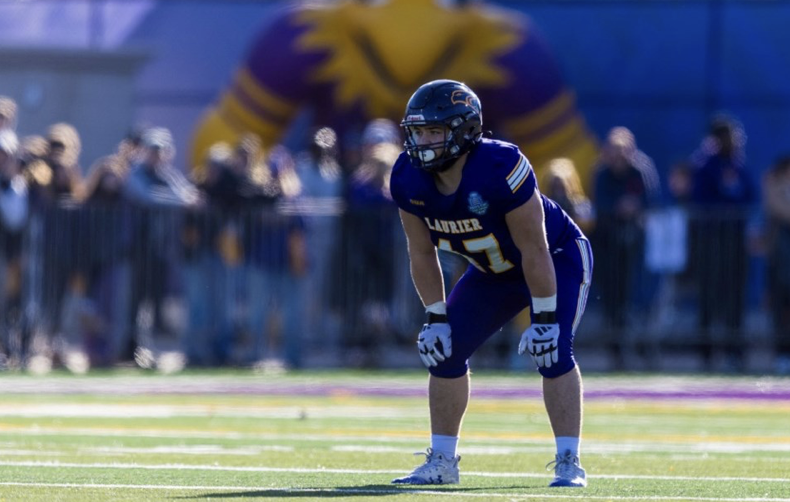 Meet Marcus Tenney, a top defensive tackle from Wilfrid Laurier University, known for his strength and versatility on the field.