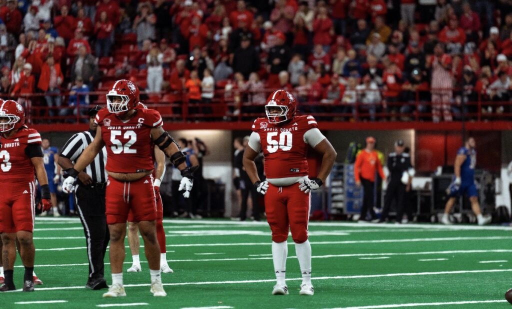 Meet Chris Dixon, a standout defensive tackle from the University of South Dakota with a passion for football and family.